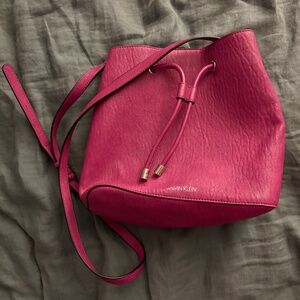 Pink Calvin Klein satchel purse.